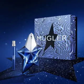 Mugler Alien perfume placed in an artistic setting with Mugler coupons.